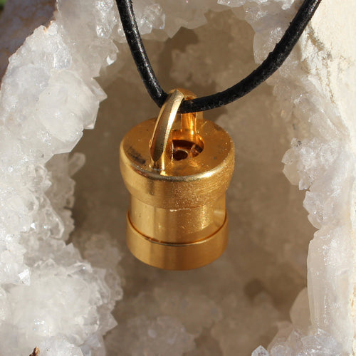 Gold-Magie diamond pendant in bronze-gold with ruby and Nuummite