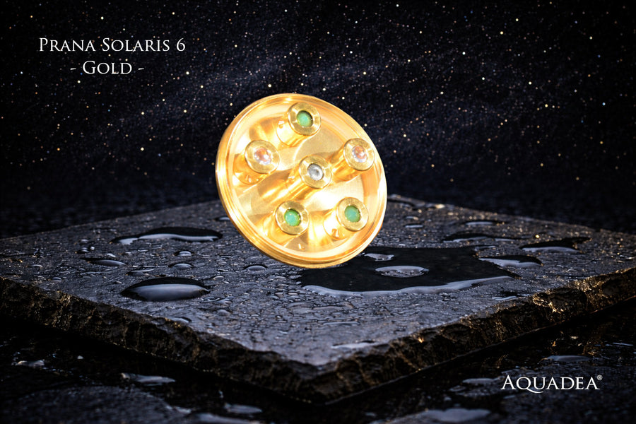 Prana Solaris 6 gold-titanium crystal vortex shower on granite