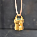 Cohérence One emerald pendant in gold, hanging