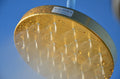 The Golden Shower Portal – gold-titanium commissioned installation by Aquadea