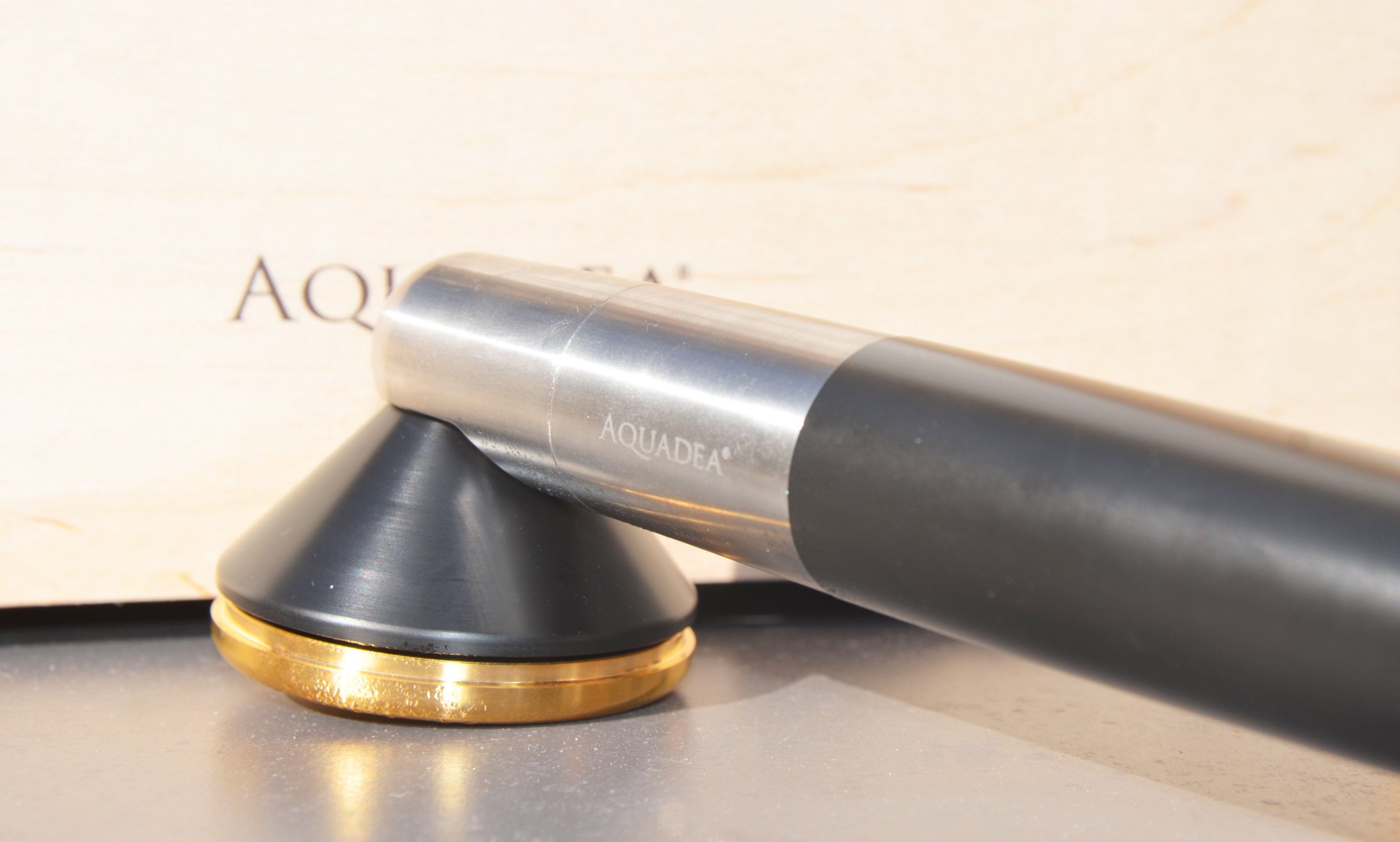 Titanium handle with gold resonance plate